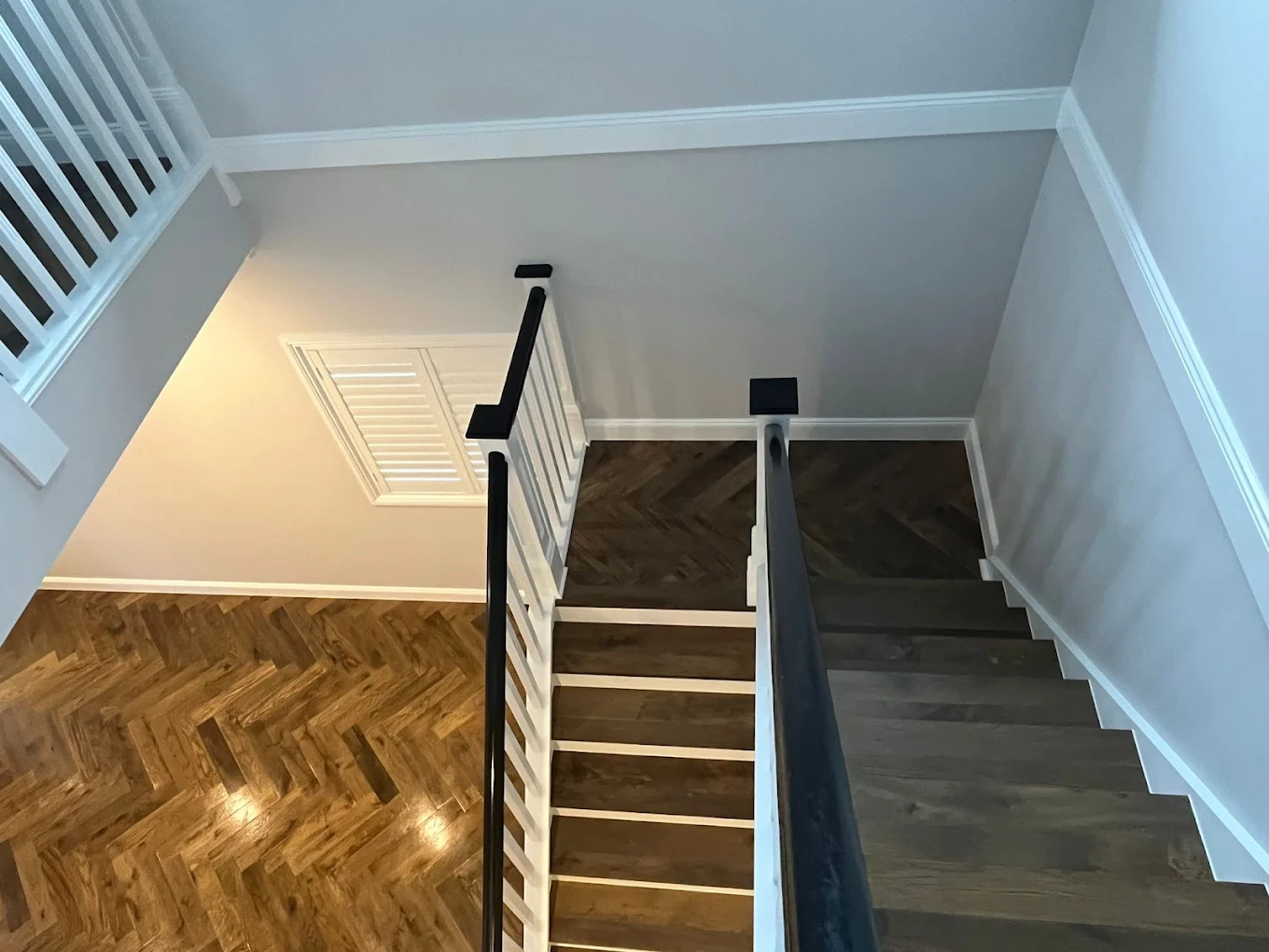 Staircase and herringbone flooring